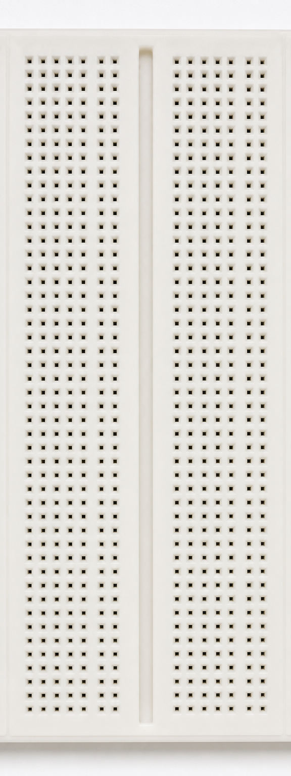 Realistic vertical solderless breadboard cropped to remove both side power rails.